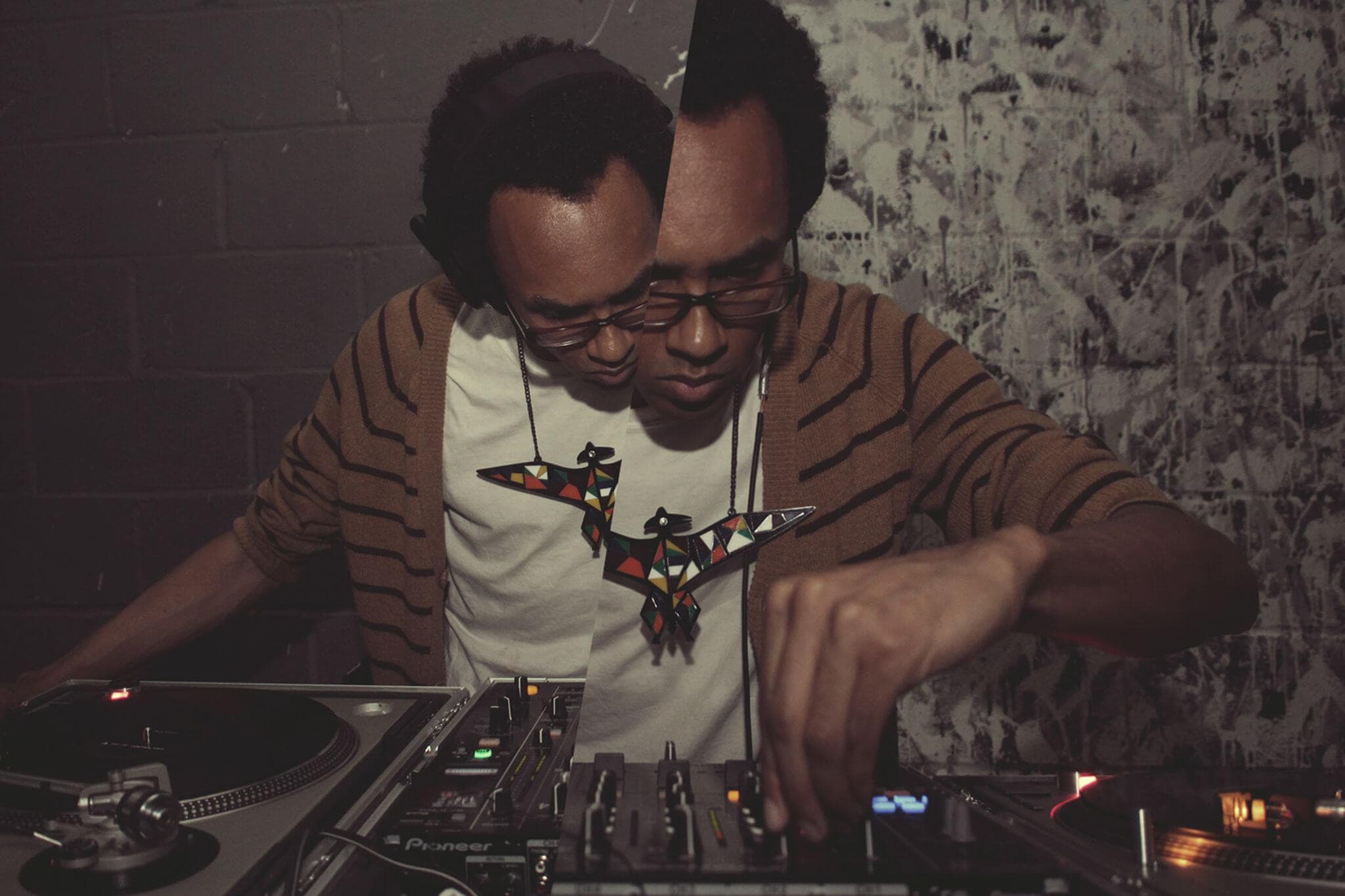Image of artist Jace Clayton Dj-ing
